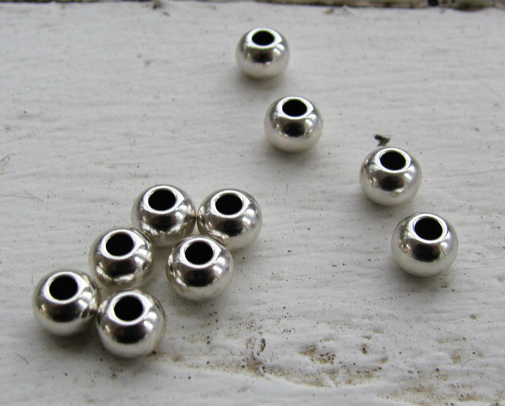 Mellandel silverfärgad - Rund med större hål 6x4mm 10-pack Grekisk Metall