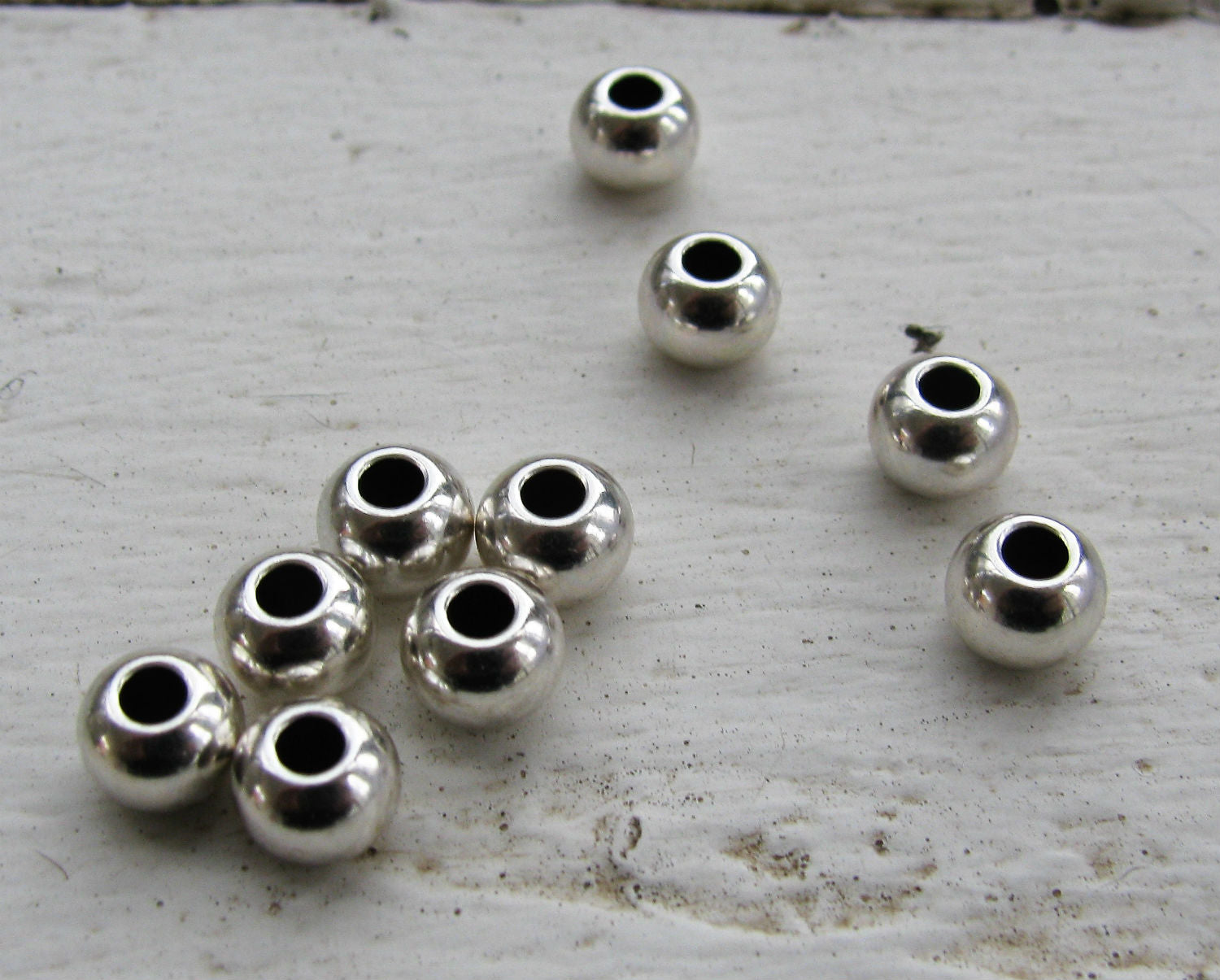 Mellandel silverfärgad - Rund med större hål 6x4mm 10-pack Grekisk Metall