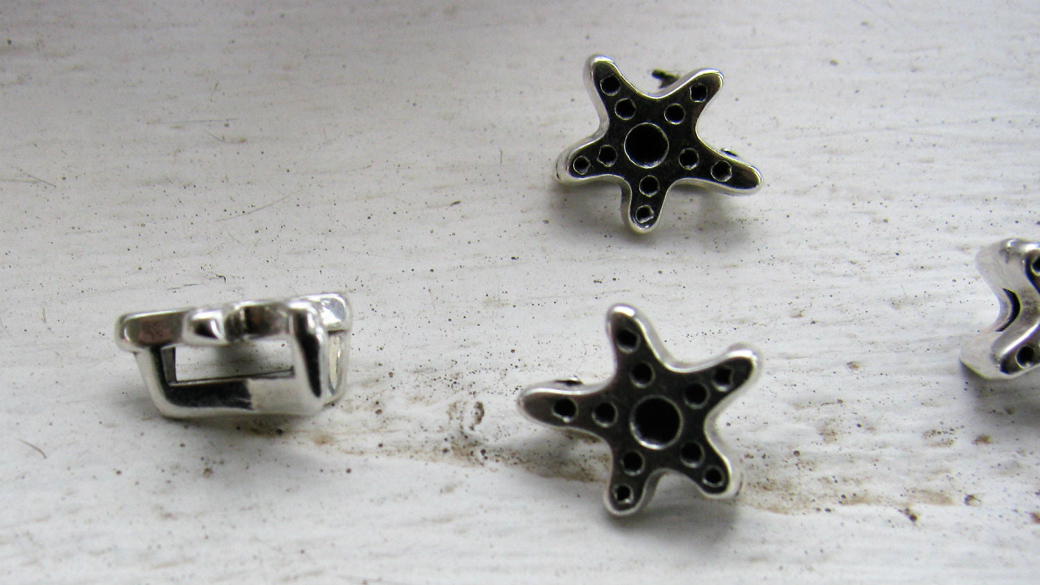 Mellandel / Silder Silverfärgad - Stjärna 8mm 4-pack Grekisk Metall