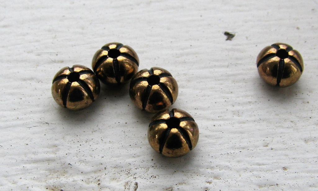 Mellandel Bronsfärgad - Rund pumpa 6x4,6mm, 5-pack Grekisk Metall