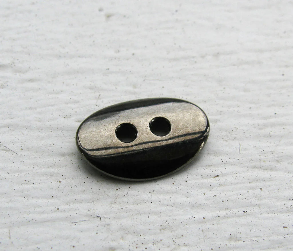 Metallknapp Guntmetallfärgad - Oval 14x10 mm 1 styck Grekisk Metall