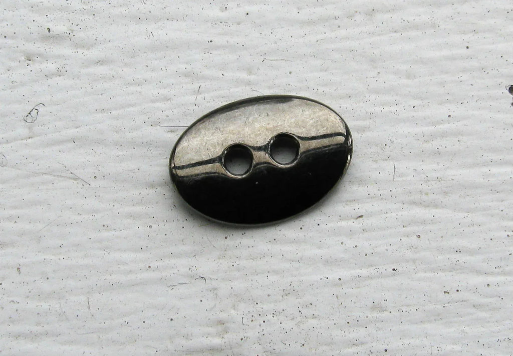 Metallknapp Guntmetallfärgad - Oval 14x10 mm 1 styck Grekisk Metall