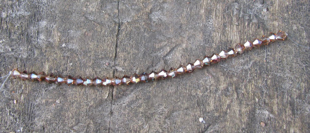 Tjeckiska MC Bicone - Crystal Venus 4 mm, 1 sträng Preciosa