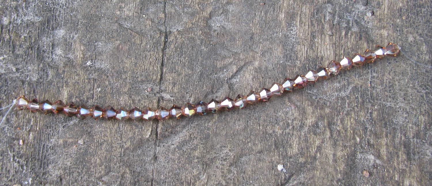 Tjeckiska MC Bicone - Crystal Venus 4 mm, 1 sträng Preciosa