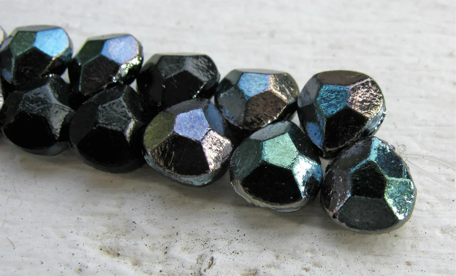 Briolette - Jet Celsian 9x10mm, 1 sträng Hilmas Pyssel