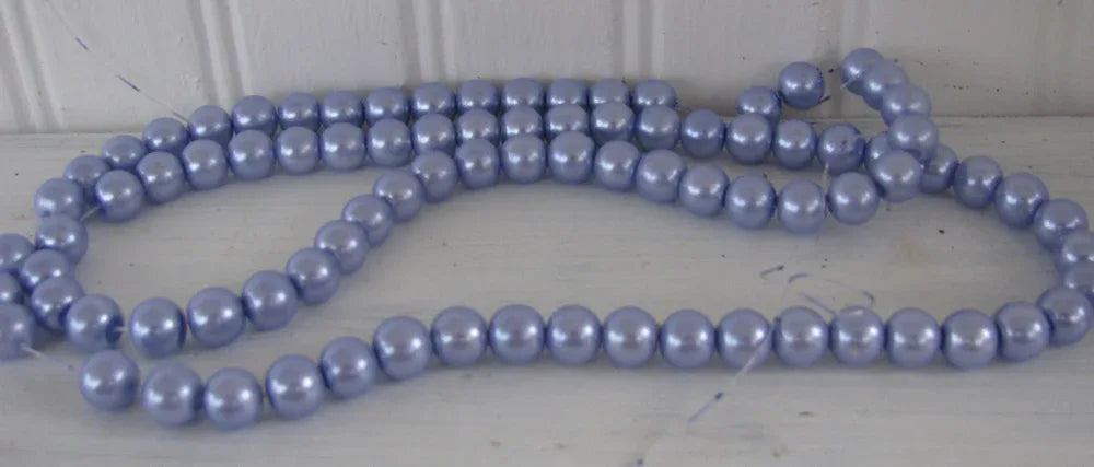 Vaxade glaspärlor - Syren 10 mm 1 sträng Hilmas Pyssel