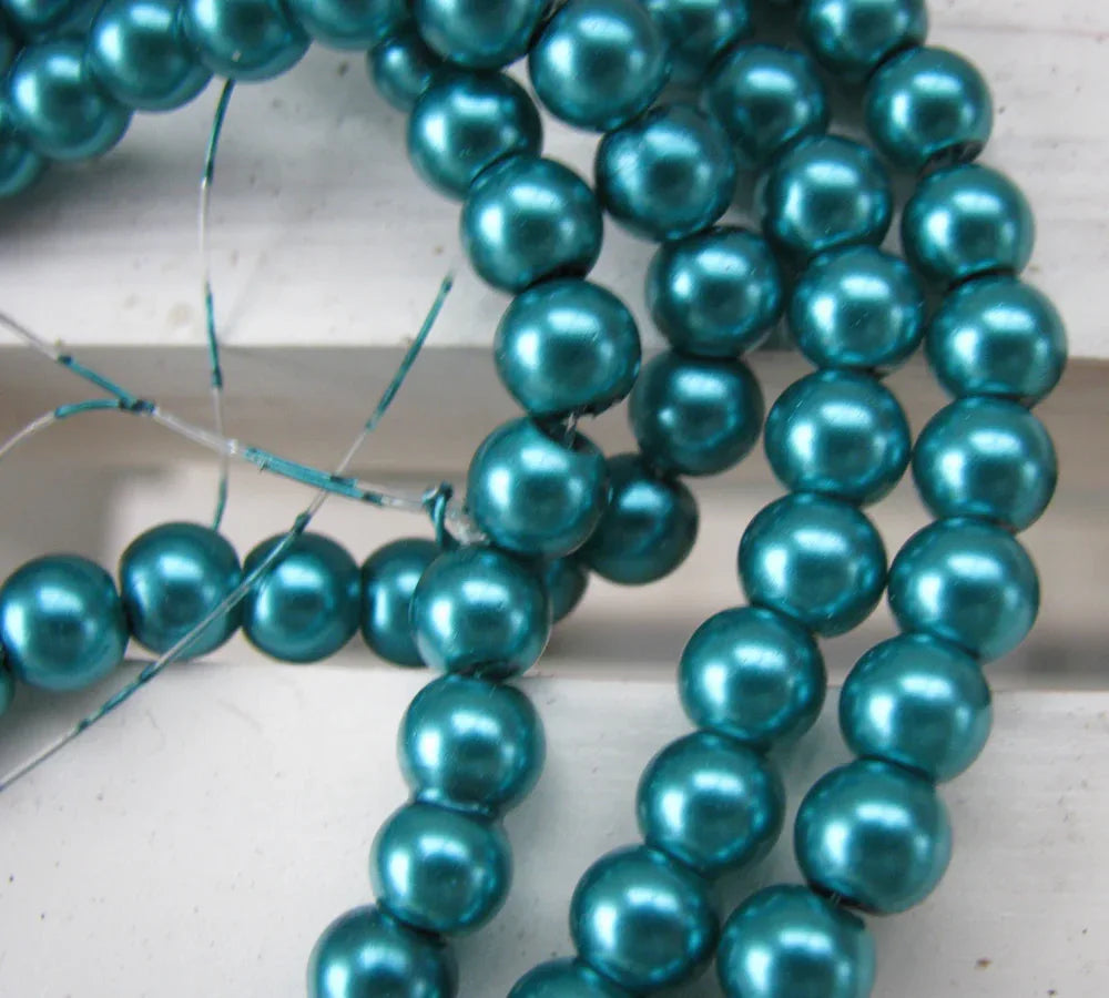 Vaxade Glaspärlor - Ljusteal 6mm 1 sträng Hilmas Pyssel