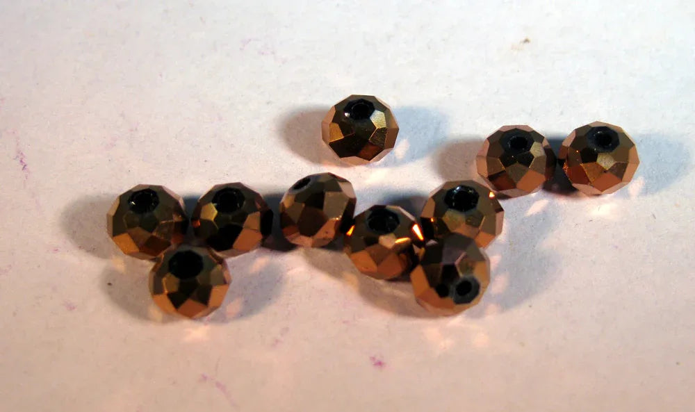 Facetterade glaspärlor - Elektropläterade koppar 6x4mm 1 sträng Hilmas Pyssel