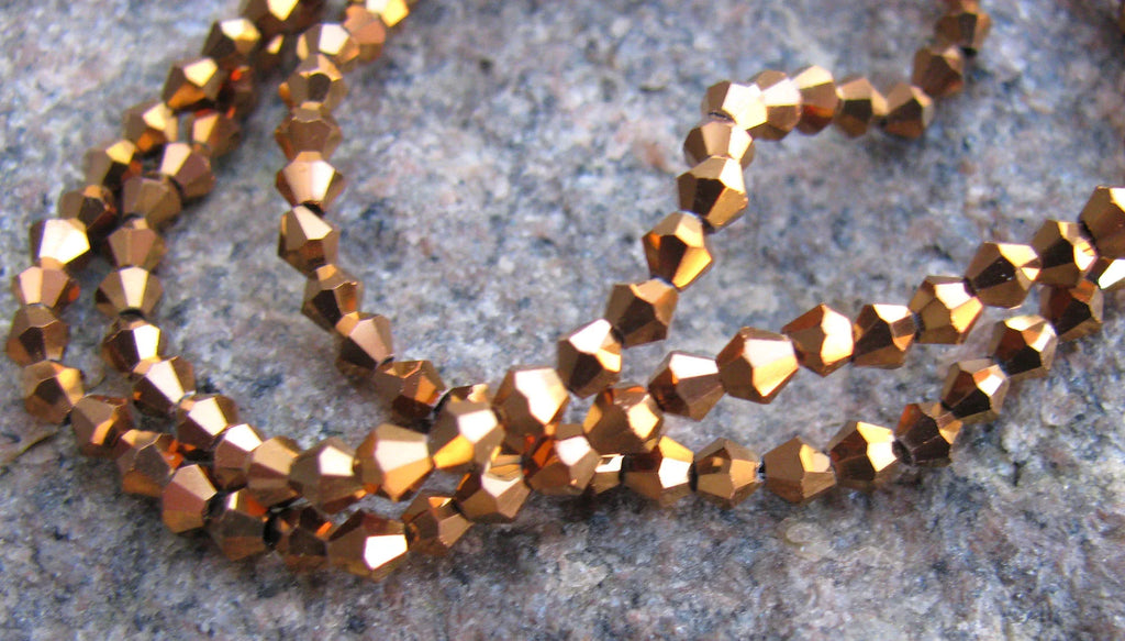 Glaspärlor Bicone - Elektropläterade Brons 3mm, 1 sträng Hilmas Pyssel