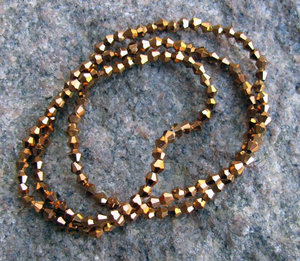 Glaspärlor Bicone - Elektropläterade Brons 3mm, 1 sträng Hilmas Pyssel