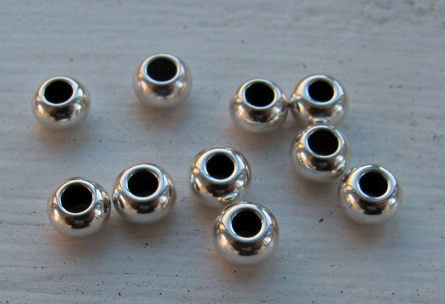 Mellandel Silverfärgad - Rund 6x4 mm, 10-pack Grekisk Metall