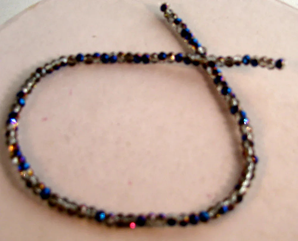 Facetterade glaspärlor - Klar/Olja, 3x2mm, 1 sträng Hilmas Pyssel