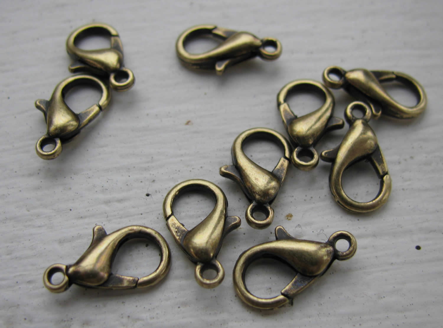 Klolås Bronsfärgat - Kvalitetslås 12 mm 10-pack Grekisk Metall