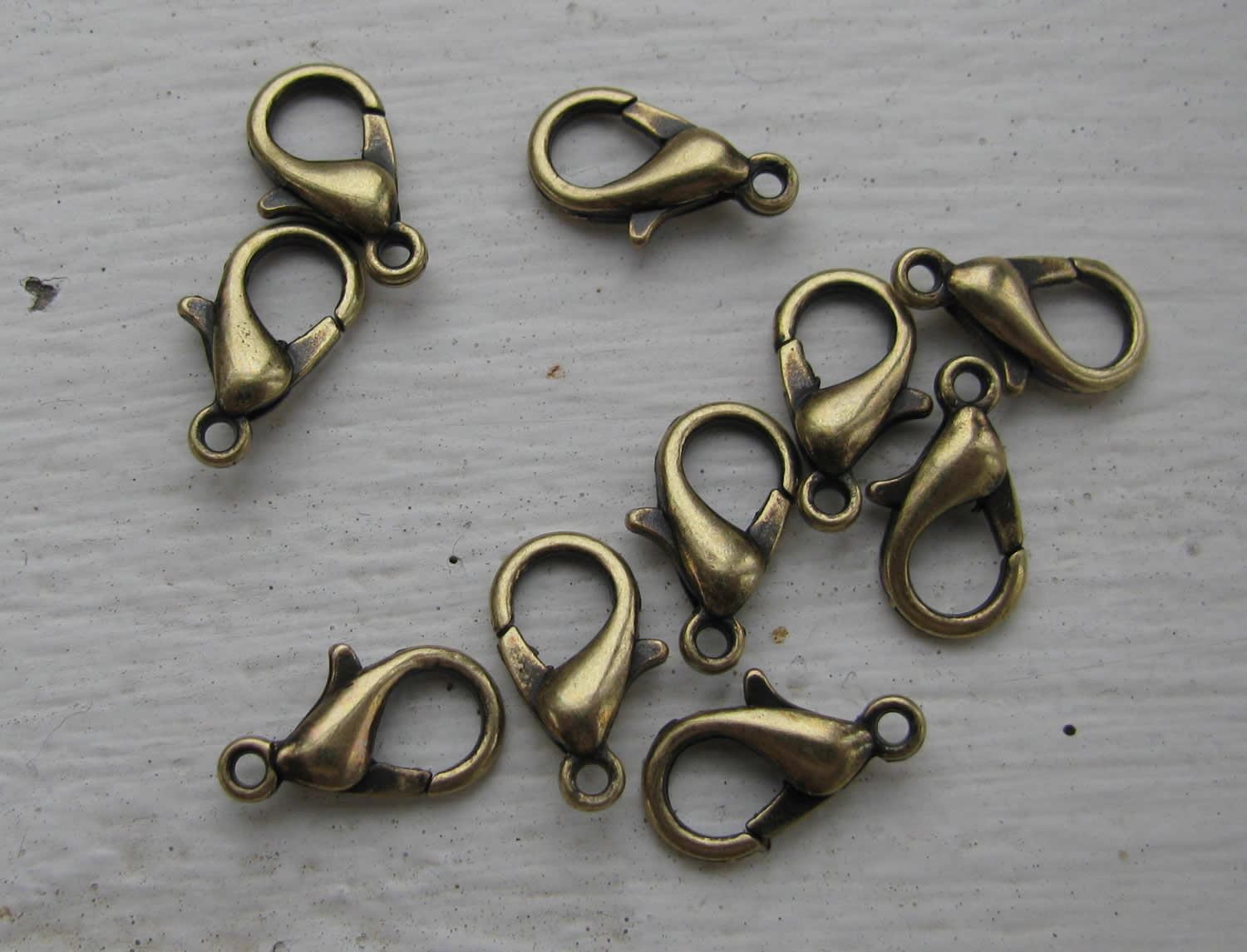 Klolås Bronsfärgat - Kvalitetslås 12 mm 10-pack Grekisk Metall