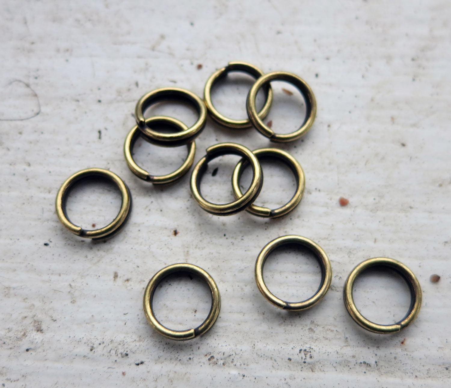 Motringar - Bronsfärgade 7mm 10-pack Grekisk Metall