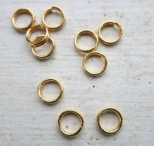 Motringar - Guldfärgade 7mm 10-pack Grekisk Metall
