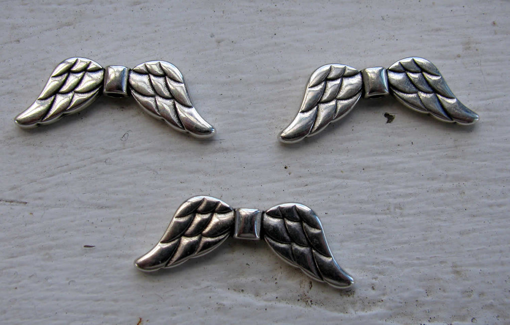 Mellandel silverfärgade - Större änglavingar 31x11mm 3-pack Grekisk Metall