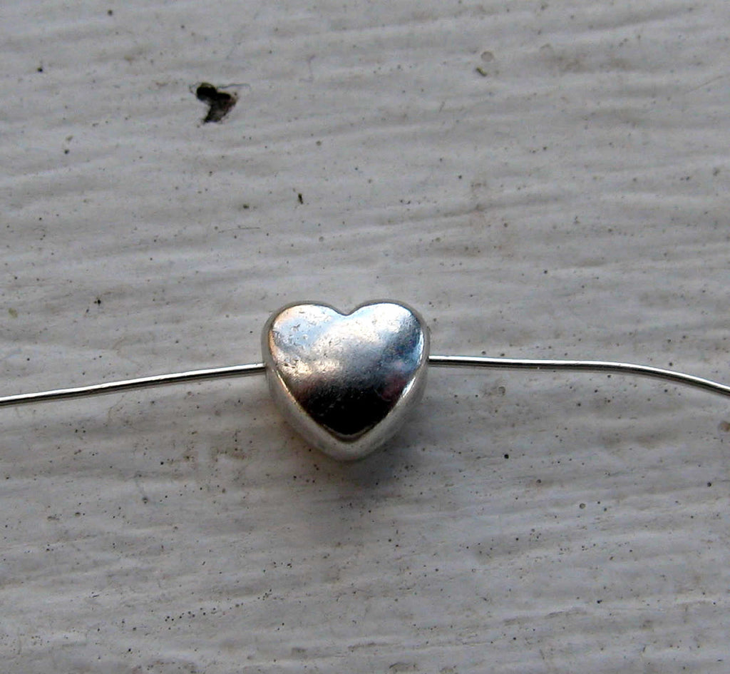 Mellandel Silverpläterad - Mindre bulligt hjärta, 6mm, 10-pack Grekisk Metall