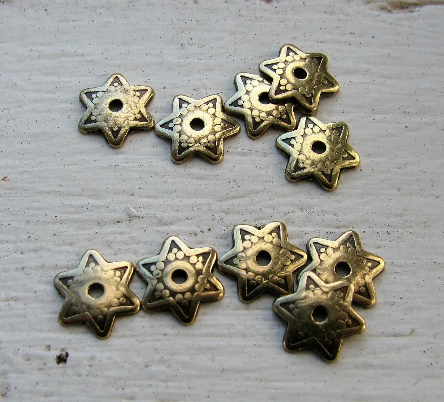 Pärlhattar bronsfärgade - Stjärna 9mm, 10-pack Grekisk Metall