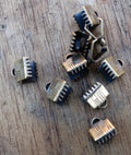 Ändfäste platta band Bronsfärgad - Bredare modell, 6 mm, 10-pack Grekisk Metall