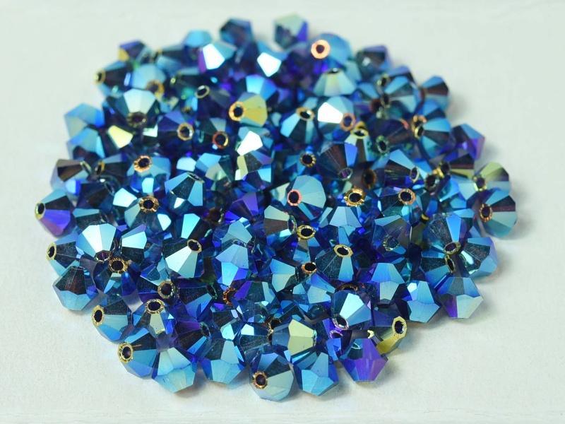 Tjeckiska Bicone - Deep Tanzanite 2x AB, 4 mm, 24-pack Preciosa