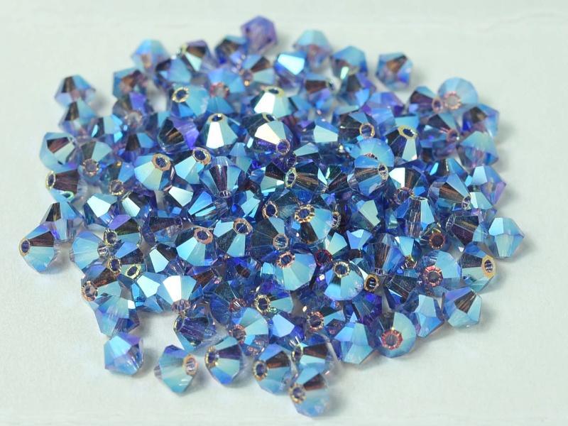 Tjeckiska Bicone - Tanzanite 2x AB, 4 mm, 24-pack Preciosa