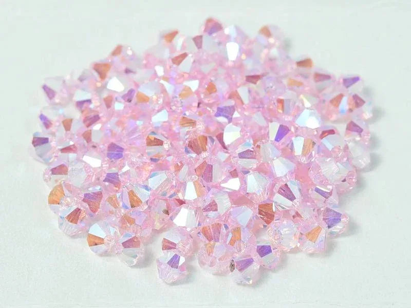 Tjeckiska Bicone - Pink Sapphire 2x AB, 4 mm, 24-pack Preciosa
