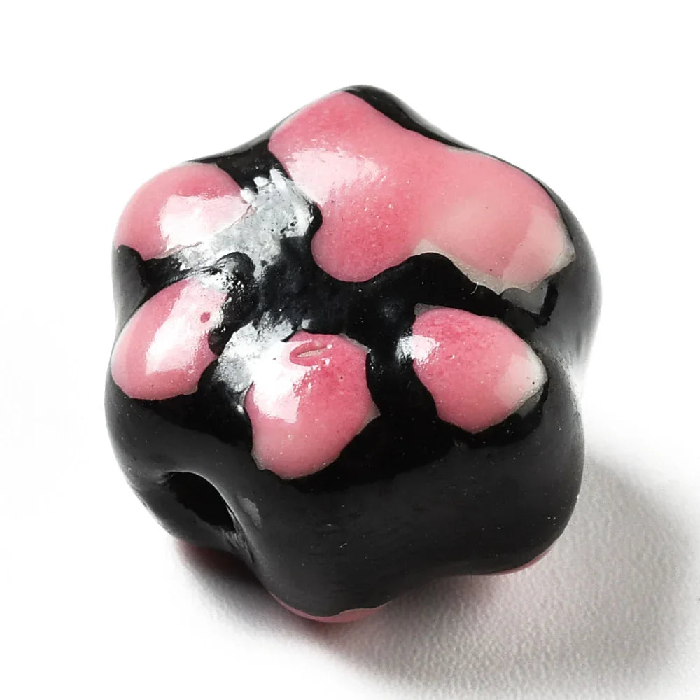 Porslinspärla - Tass svart / rosa 13x15mm 1 styck Hilmas Pyssel