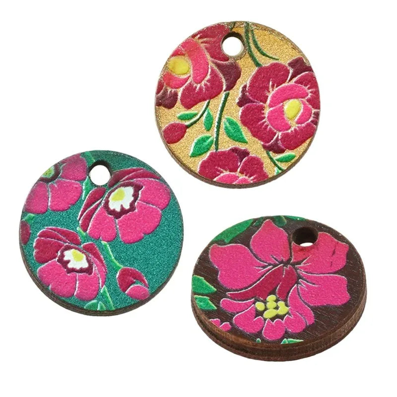 Hänge / Berlock Trä - Rund med blommor, petrol 15mm 1 styck Hilmas Pyssel