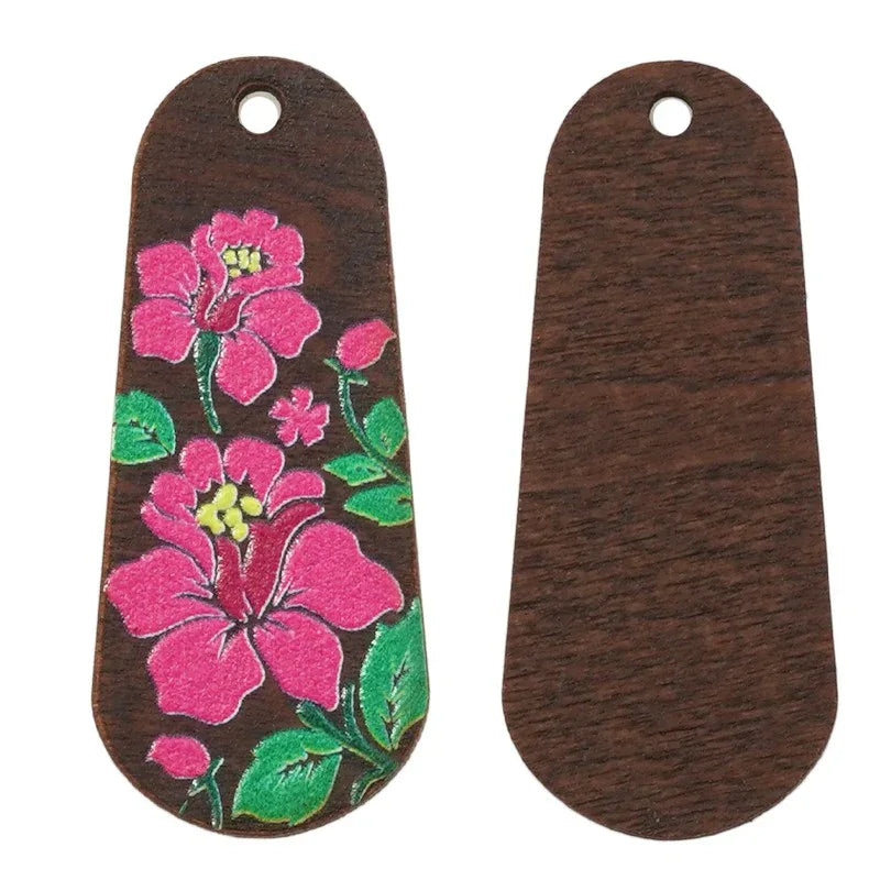 Hänge / Berlock Trä - Oval med blommor, brun 15x36mm 1 styck Hilmas Pyssel