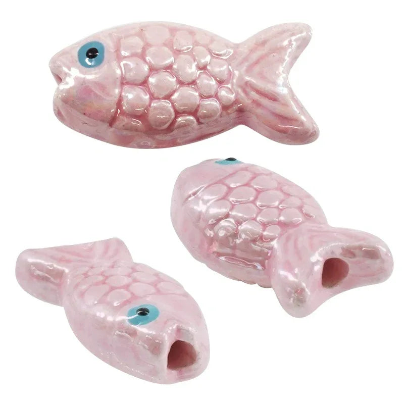 Porslinspärla - Fisk Rosa 26x12mm 1 styck Hilmas Pyssel