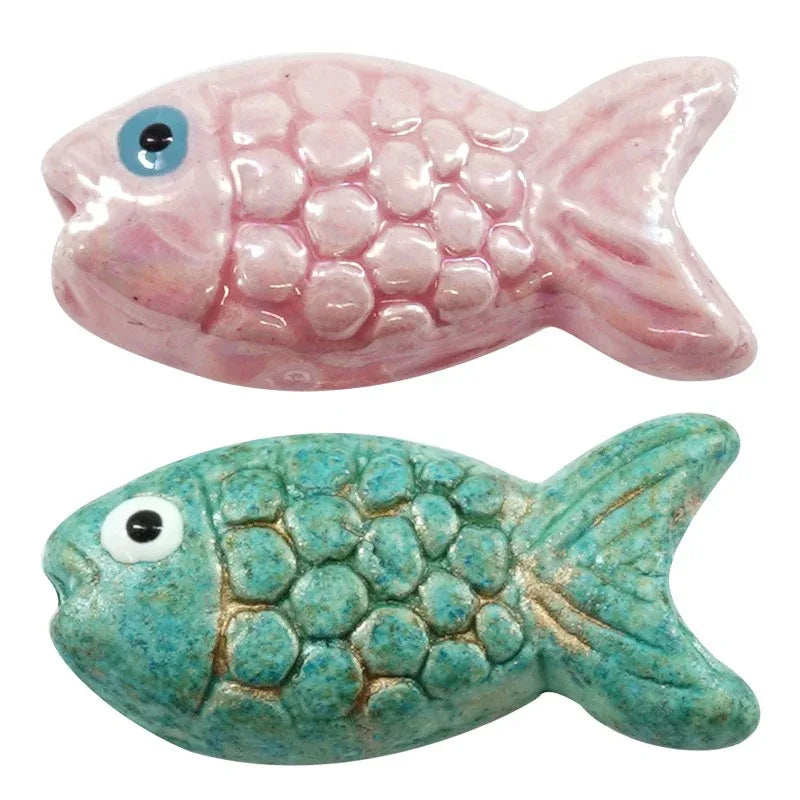 Porslinspärla - Fisk Rosa 26x12mm 1 styck Hilmas Pyssel