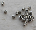 Mellandel Silverfärgad - Liten Mönstrad Cylinder, 3mm, 20-pack Grekisk Metall