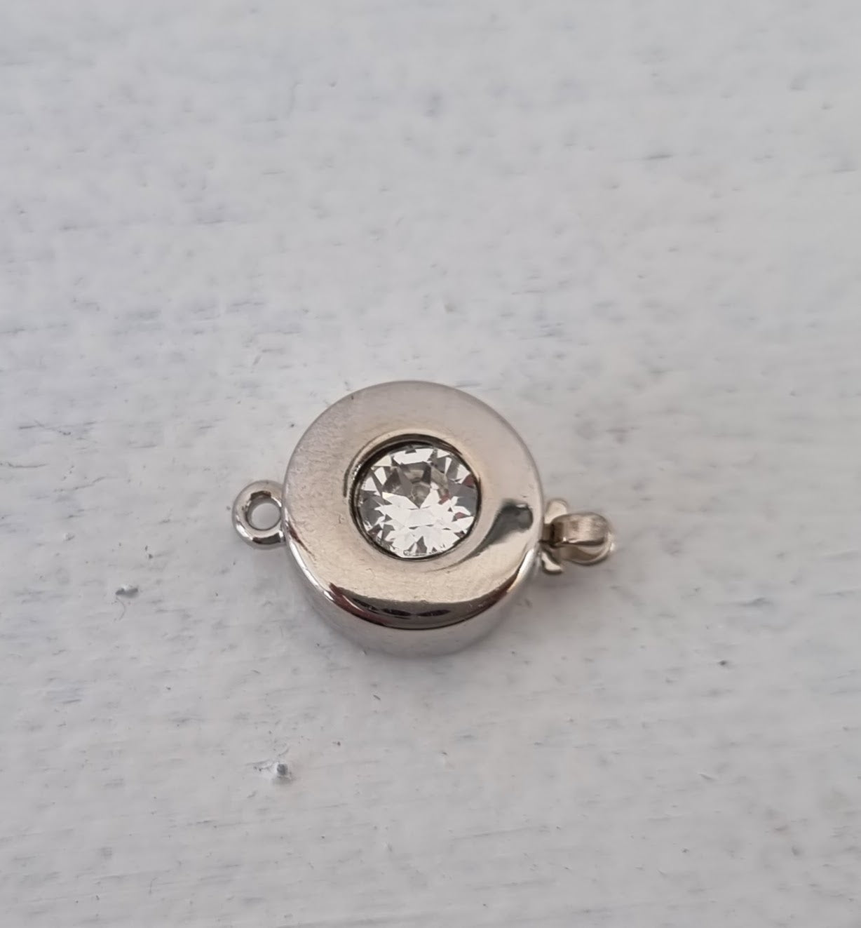 Claspgarten Instickslås - Platt rund med Swarovskikristall 12mm 1 styck Claspgarten