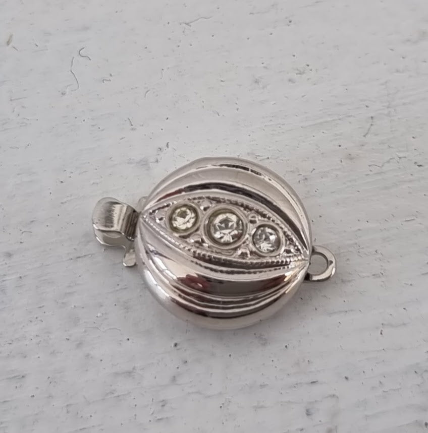 Claspgarten Instickslås - Platt rund med Swarovskikristaller 11mm 1 styck Claspgarten