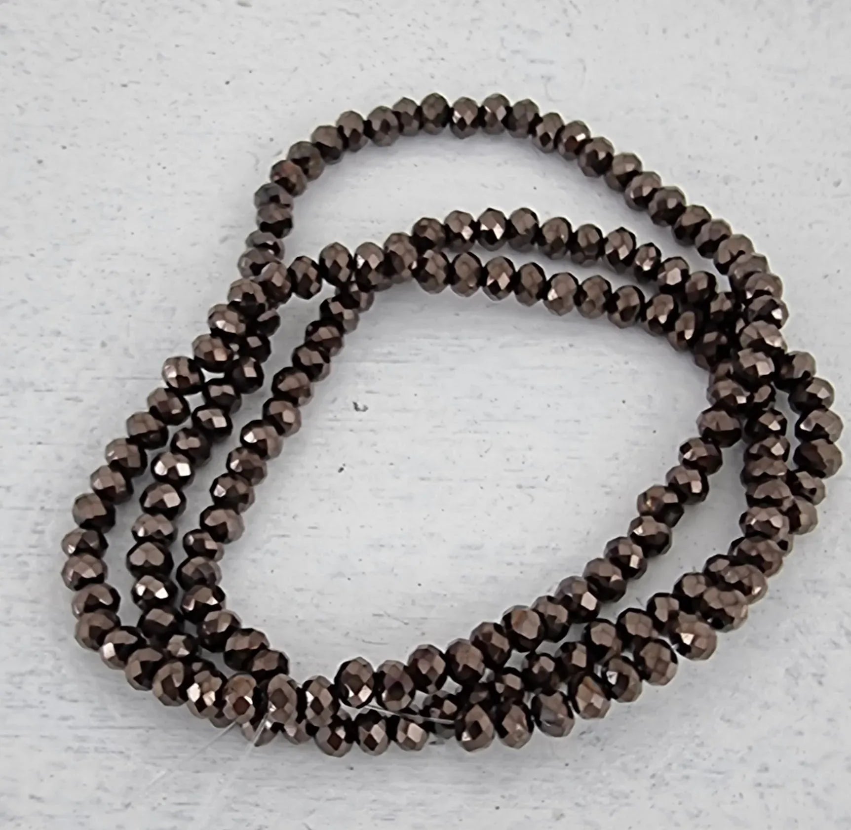 Facetterade glaspärlor - Gunmetalfärgade, 3x2.5mm 1 sträng Hilmas Pyssel