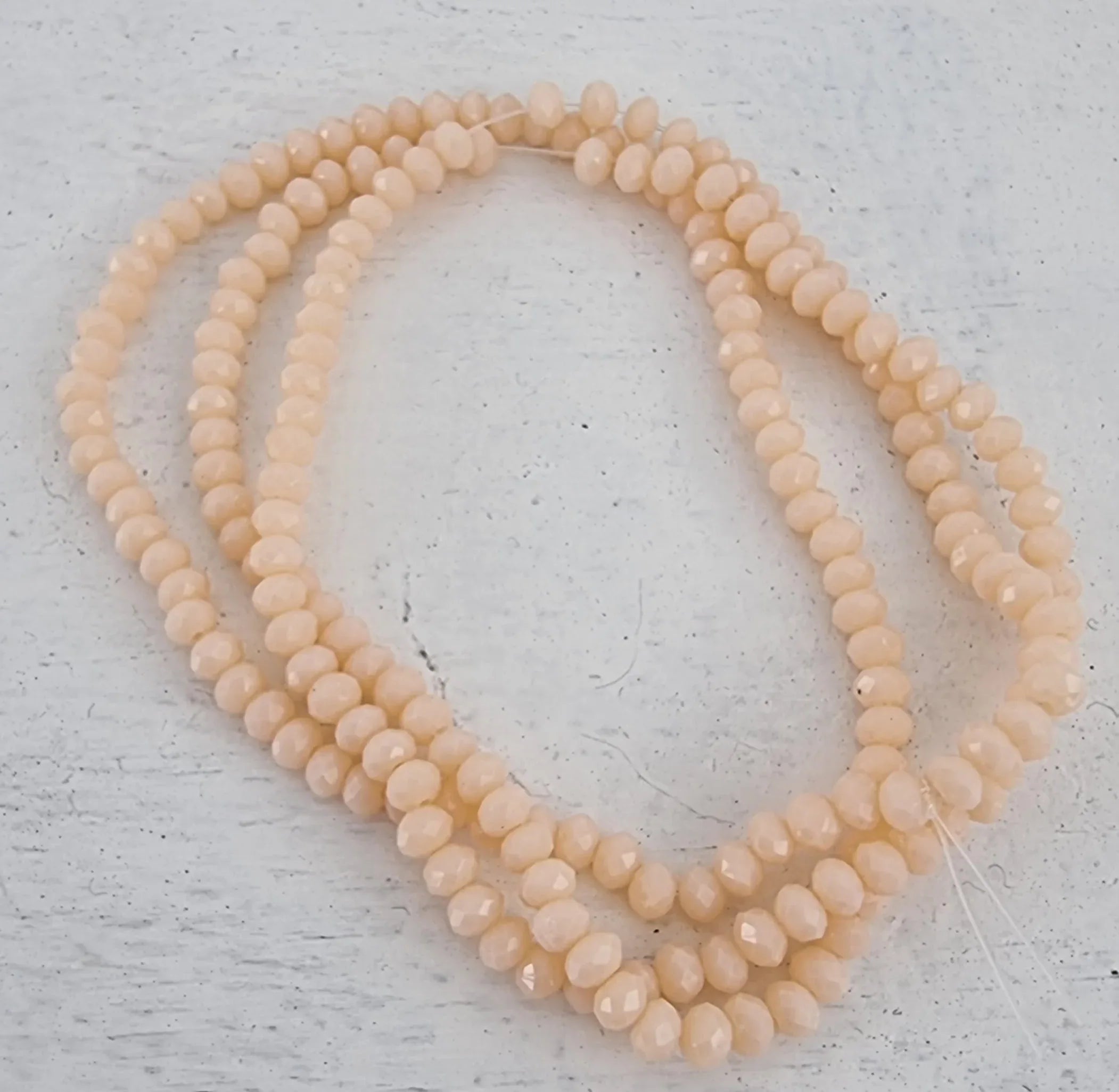 Facetterade glaspärlor - Beige, 3x2mm, 1 sträng Hilmas Pyssel