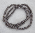 Facetterade glaspärlor - Ljusgrå, 4x3mm, 1 sträng Hilmas Pyssel