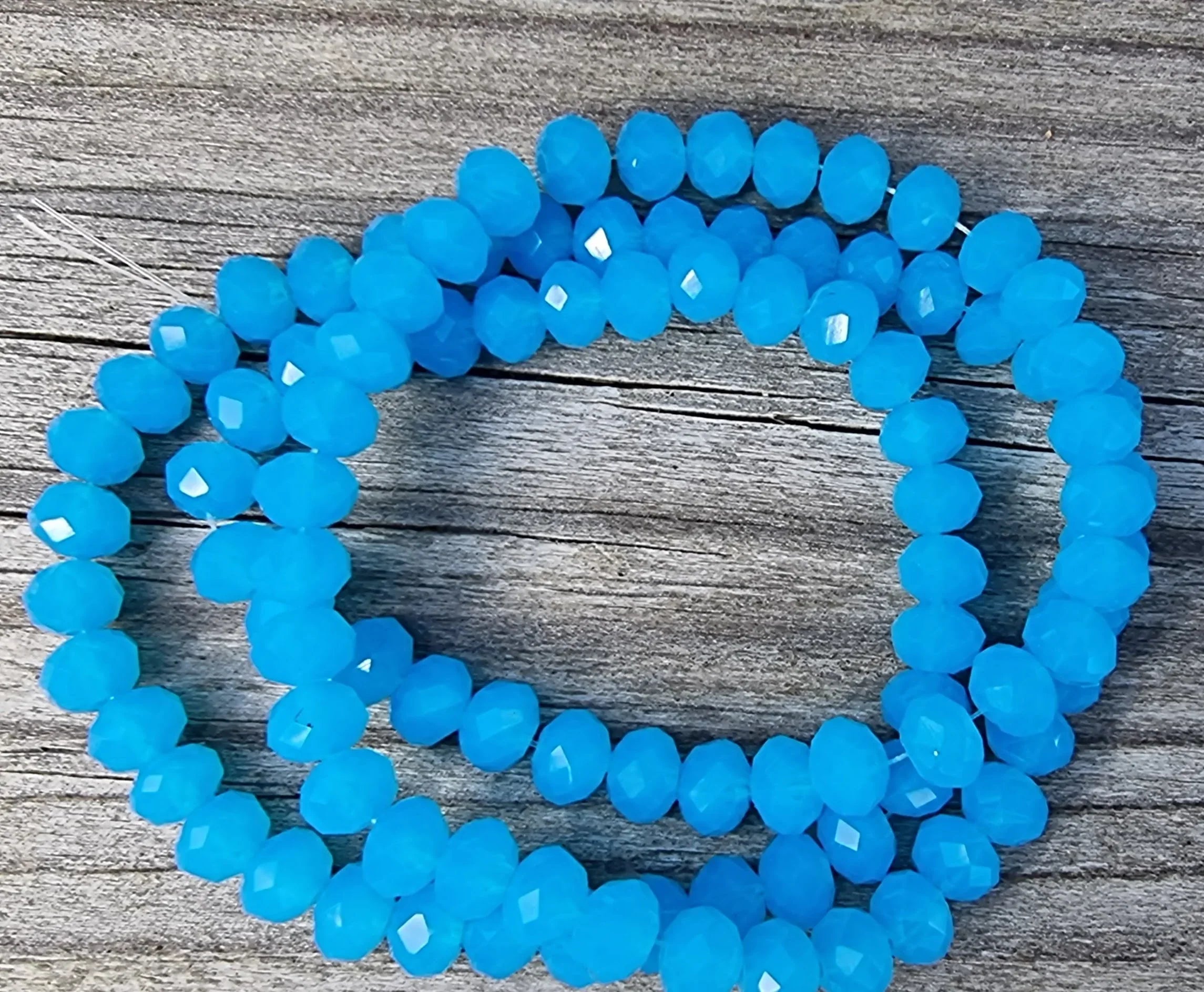 Facetterade glaspärlor - Capriblue, 6x4mm 1 sträng Hilmas Pyssel