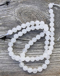 Agat facetterade runda - Mjölkig vit, 6mm 1 sträng Hilmas Pyssel