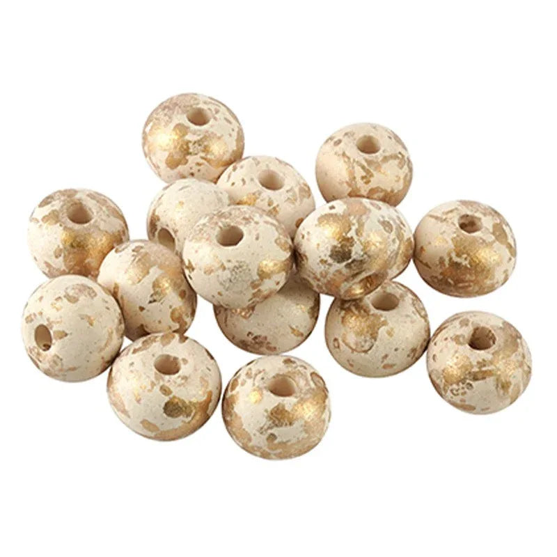 Porslinspärla - Rund vit med guldstänk, 12mm 1 styck Hilmas Pyssel