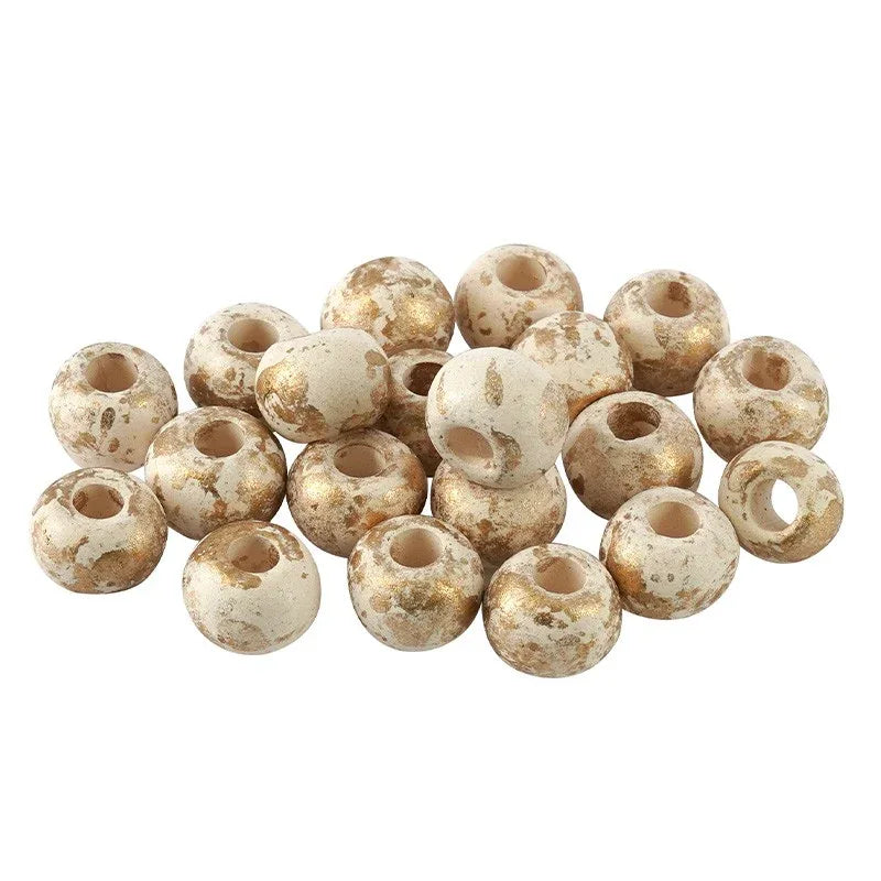 Porslinspärla - Rund vit med guldstänk, 8mm 1 styck Hilmas Pyssel