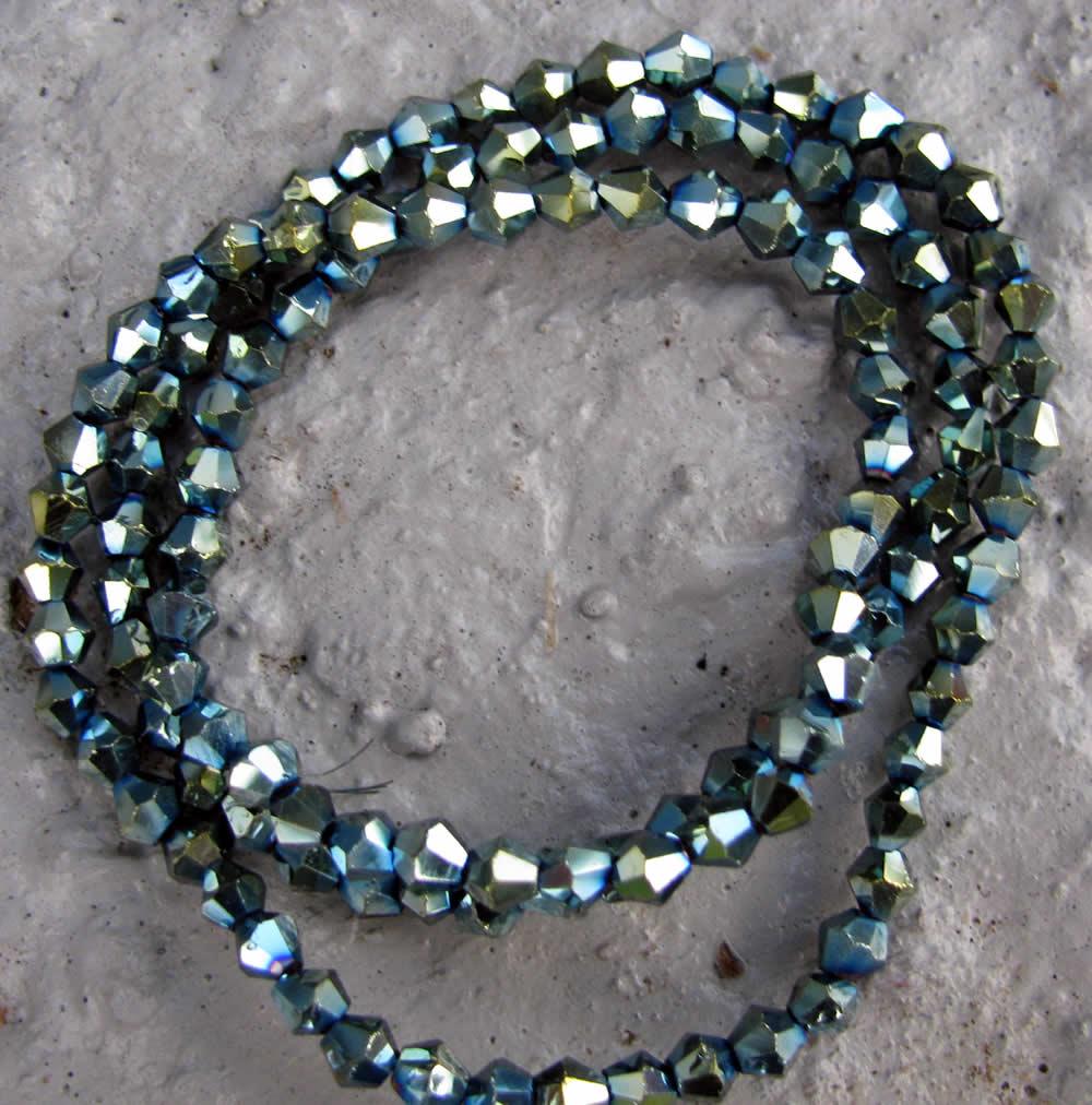 Glaspärlor Bicone - Turkos/olja 3mm, 1 sträng Hilmas Pyssel