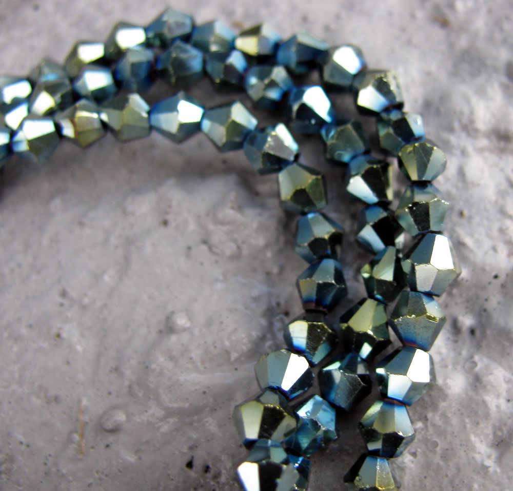 Glaspärlor Bicone - Turkos/olja 3mm, 1 sträng Hilmas Pyssel