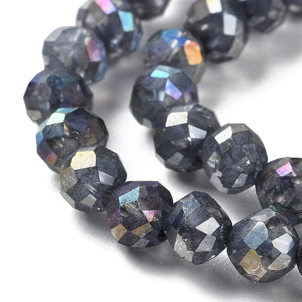 Facetterade glaspärlor - Gråsvart med lyster 6x5,5mm 1 sträng Hilmas Pyssel