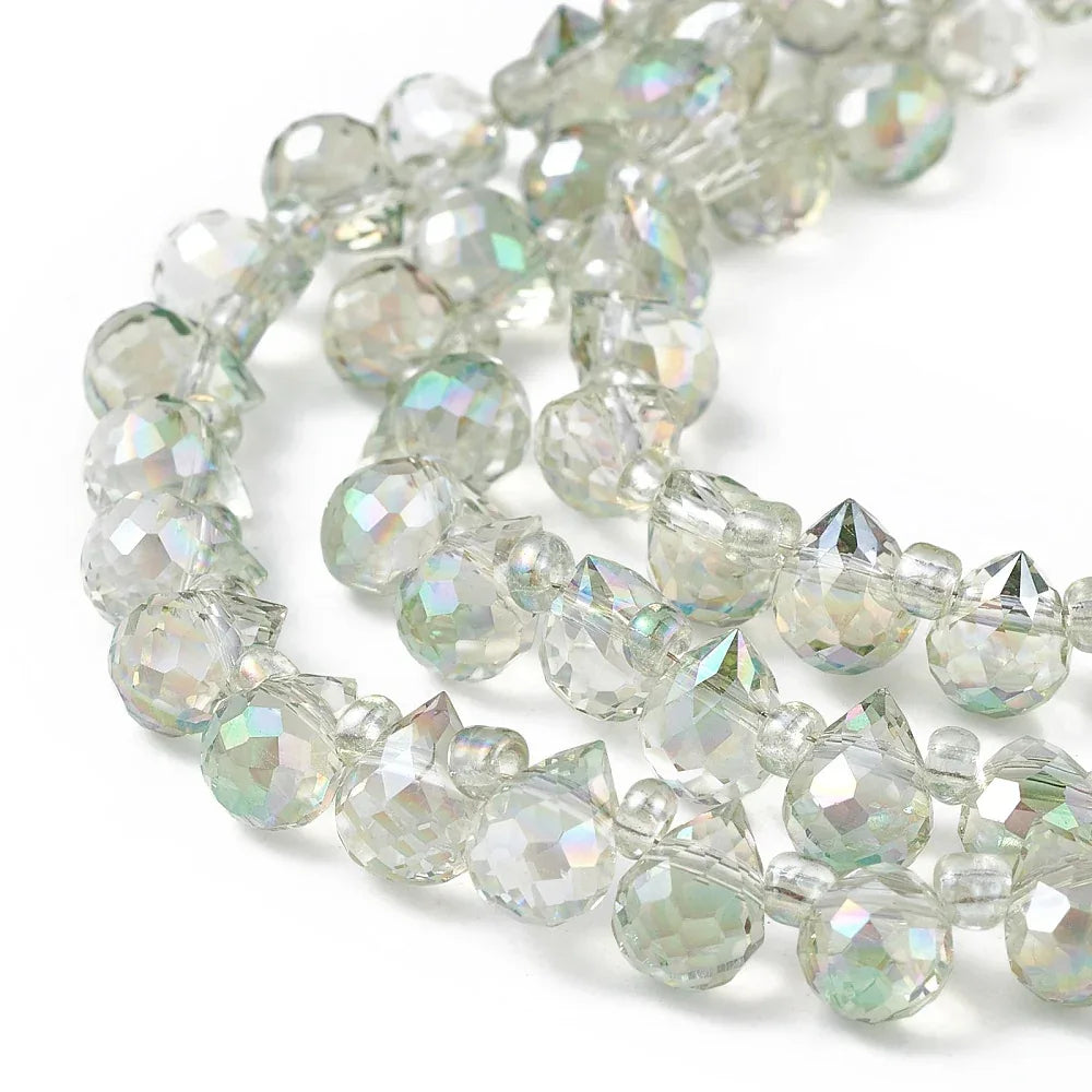 Facetterade droppar - Svag aqua med regnbågslyster, 8x6mm 1 styck Hilmas Pyssel