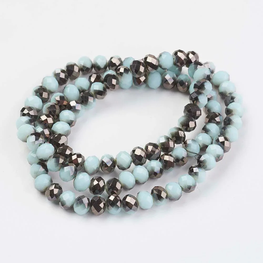 Facetterade glaspärlor - Opak svag turkos med hematitlyster, 4x3mm 1 sträng Hilmas Pyssel