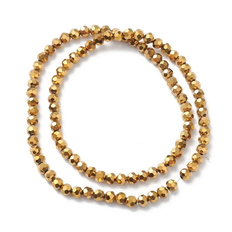 Glaspärlor Facetterade - Runda, Ep Guldfärgade, 5-6mm 1 sträng Hilmas Pyssel