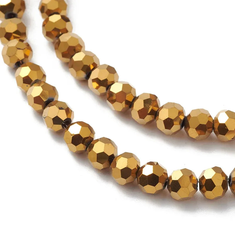 Glaspärlor Facetterade - Runda, Ep Guldfärgade, 5-6mm 1 sträng Hilmas Pyssel
