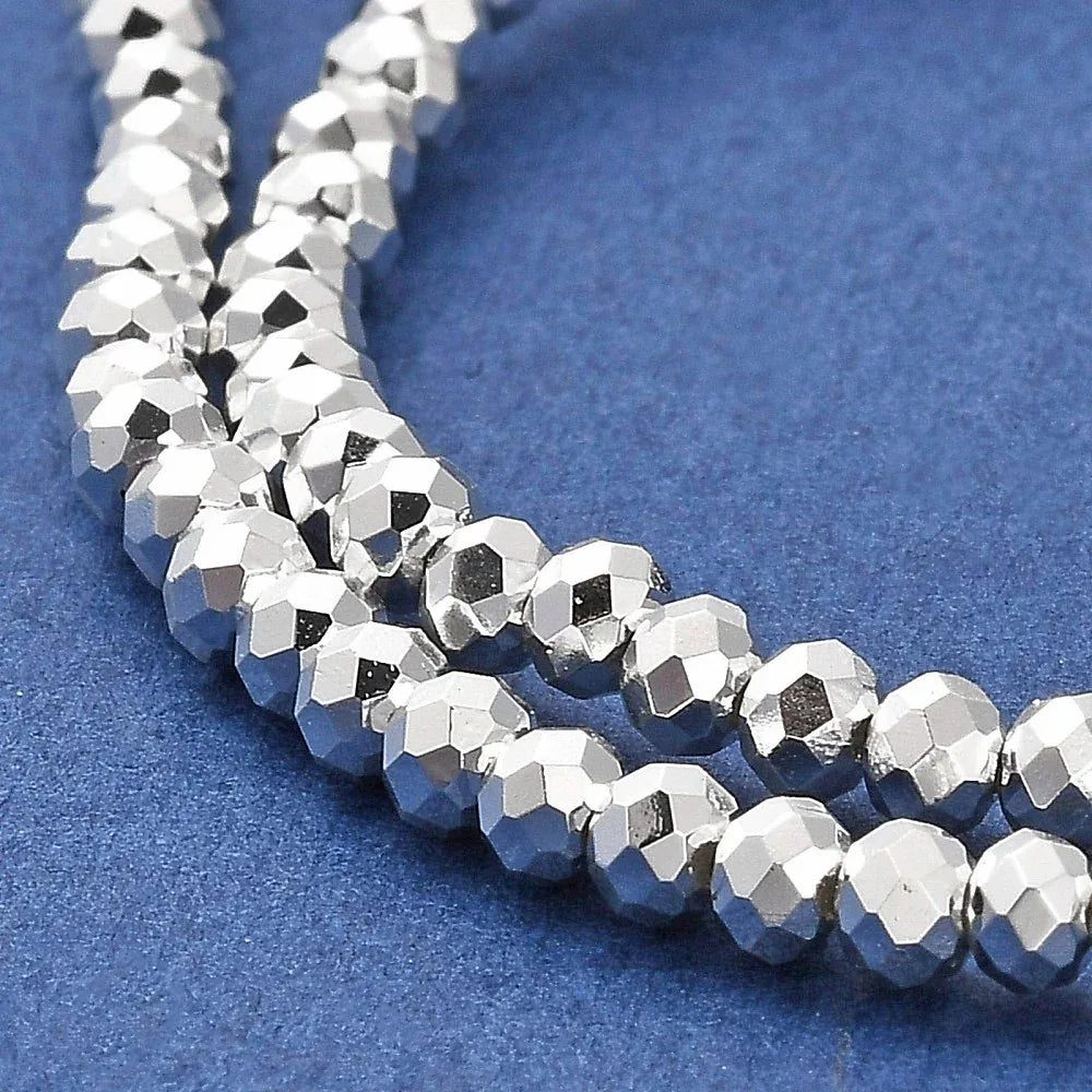 Facetterade glaspärlor - EP silverfärgad, 3x2.5mm, 1 sträng Hilmas Pyssel